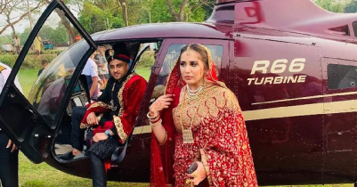 The bride and groom got off the helicopter