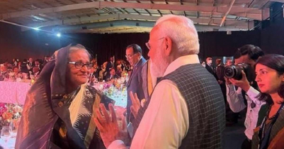 Modi walks to Sheikh Hasina to exchange pleasantries at dinner