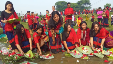 নদীতে ফুল ভাসিয়ে উদযাপিত হচ্ছে চাকমা সম্প্রদায়ের ফুল বিঝু নদীতে ফুল ভাসিয়ে উদযাপিত হচ্ছে চাকমা সম্প্রদায়ের ফুল বিঝু